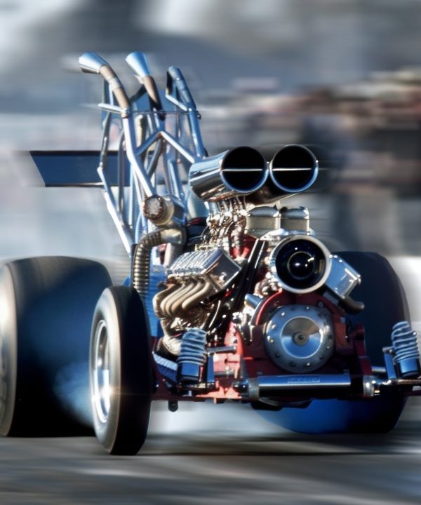 The sound of a roaring engine fills the air as a biofuelpowered dragster speeds down a track showcasing the power and potential of alternative fuels. Crowds gather to watch and learn .